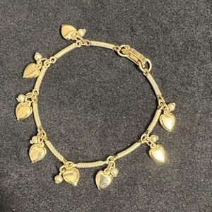 Charming Gold Heart Bracelet with small ball accents.